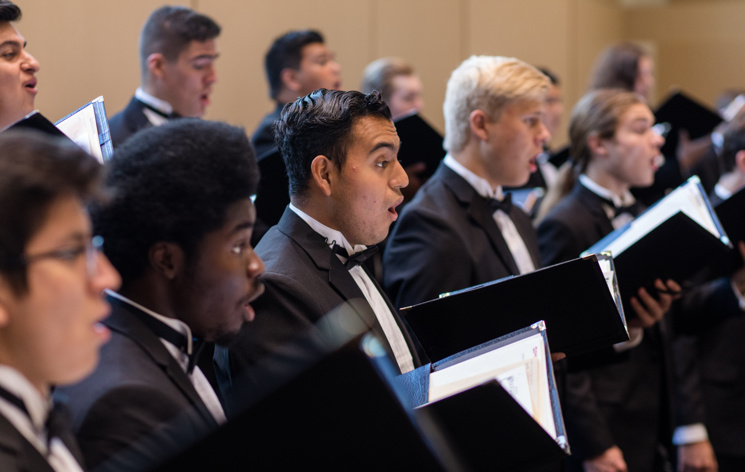 Last year’s Men’s Chorus prepares for their Fall Choral performance, which was, unfortunately, cancelled in 2020. 